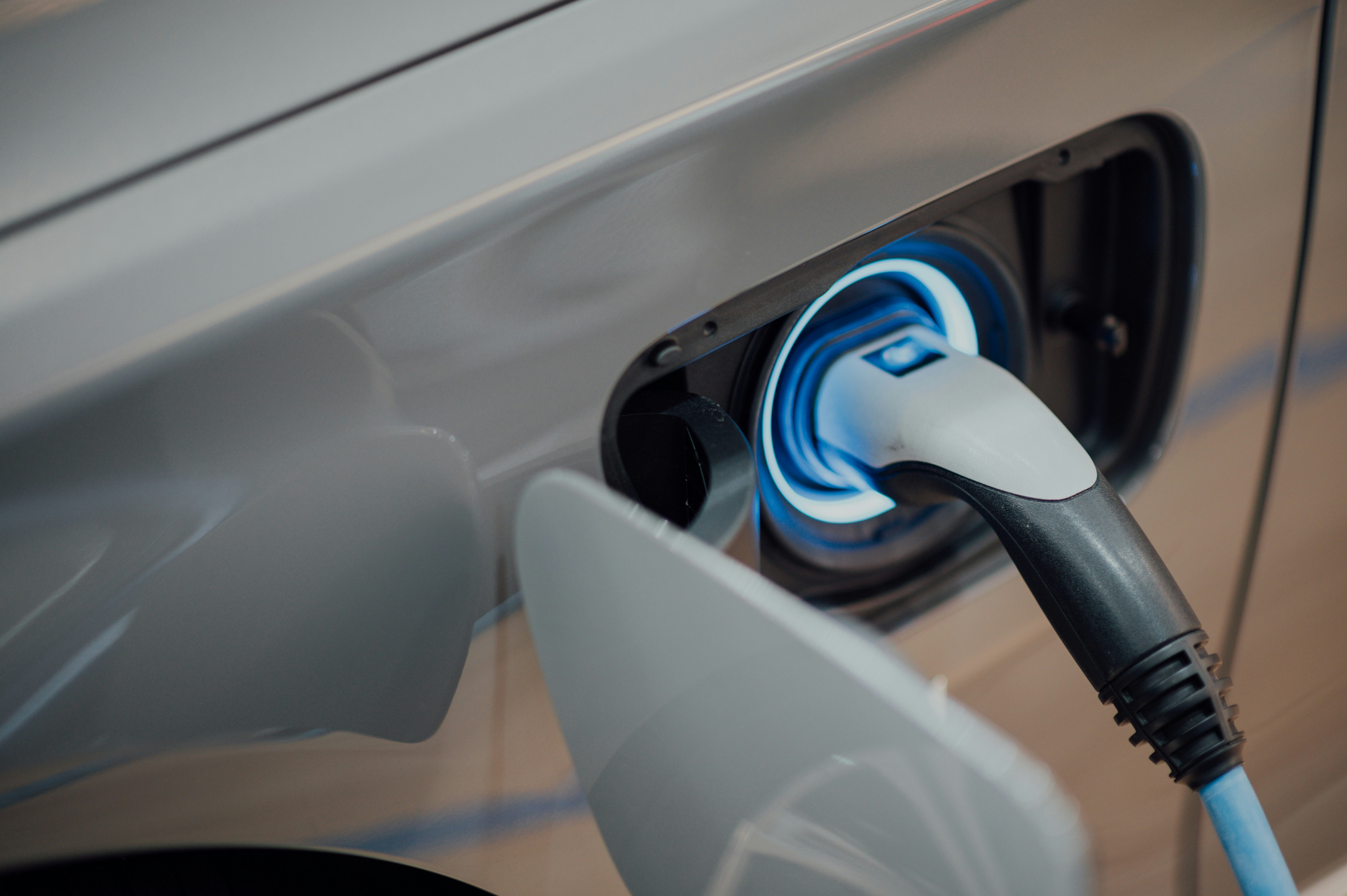 An electric car plugged in and being charged.