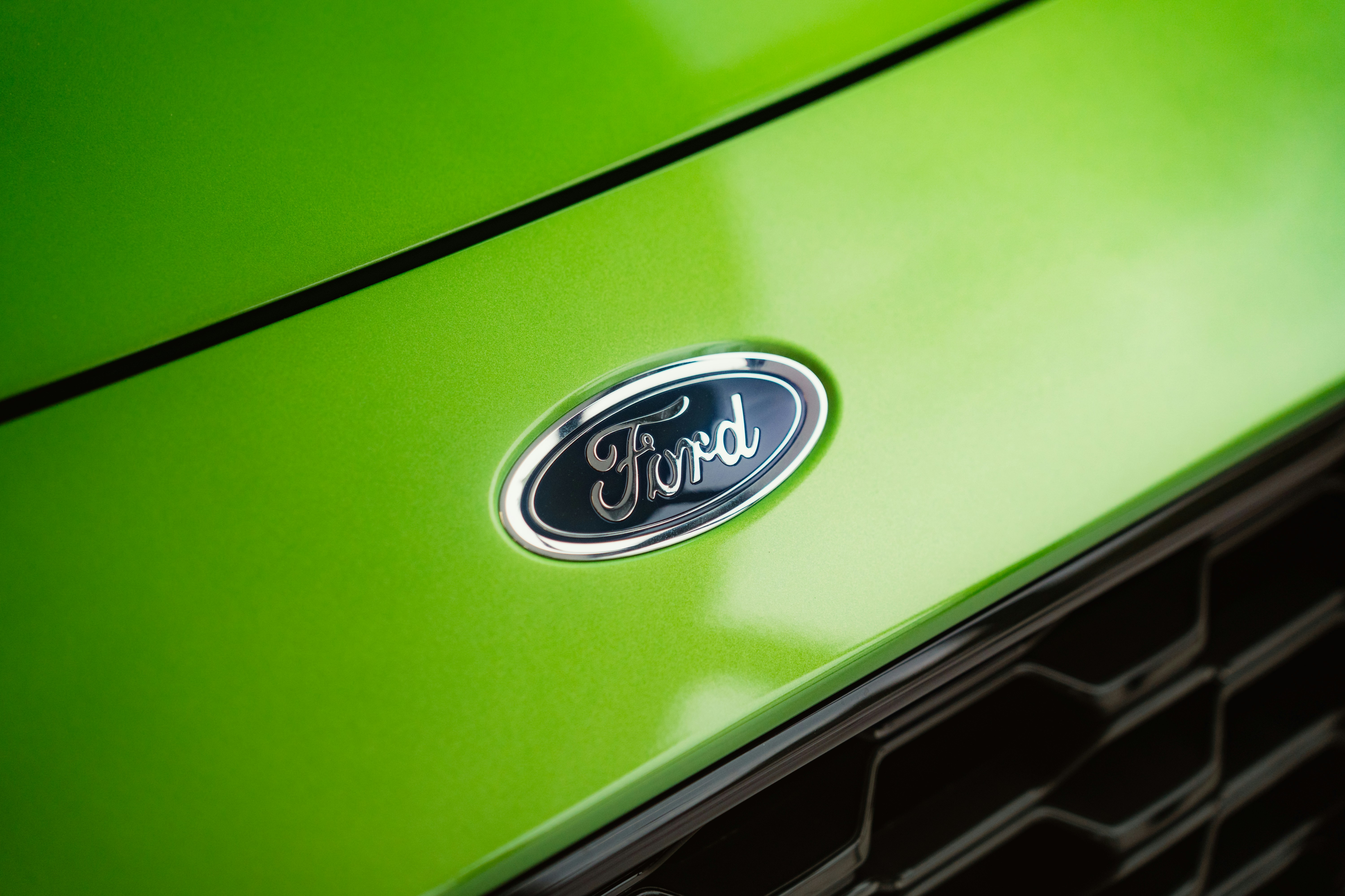 A closeup of the Ford logo.