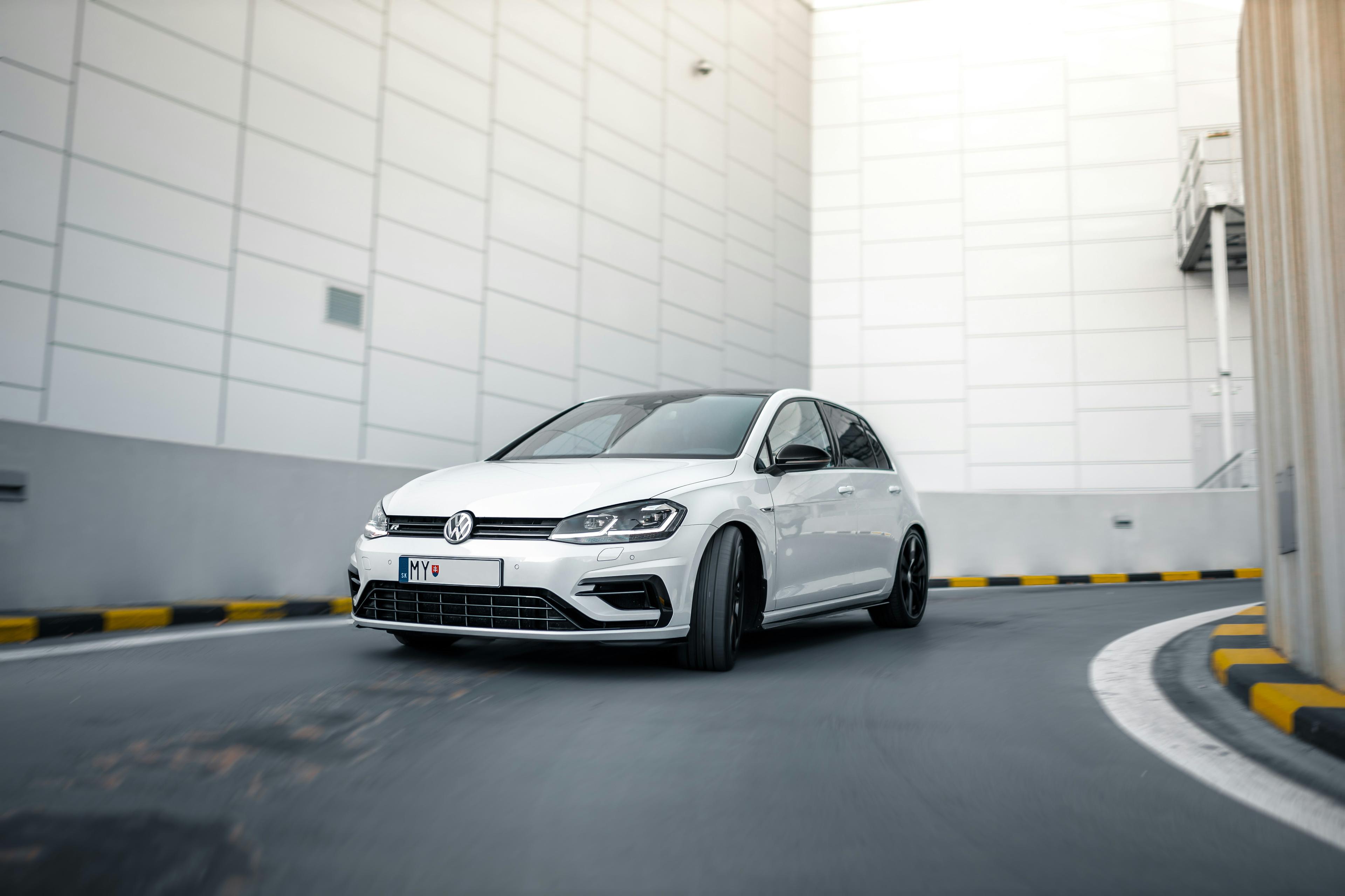 A Volkswagen Golf on the road.