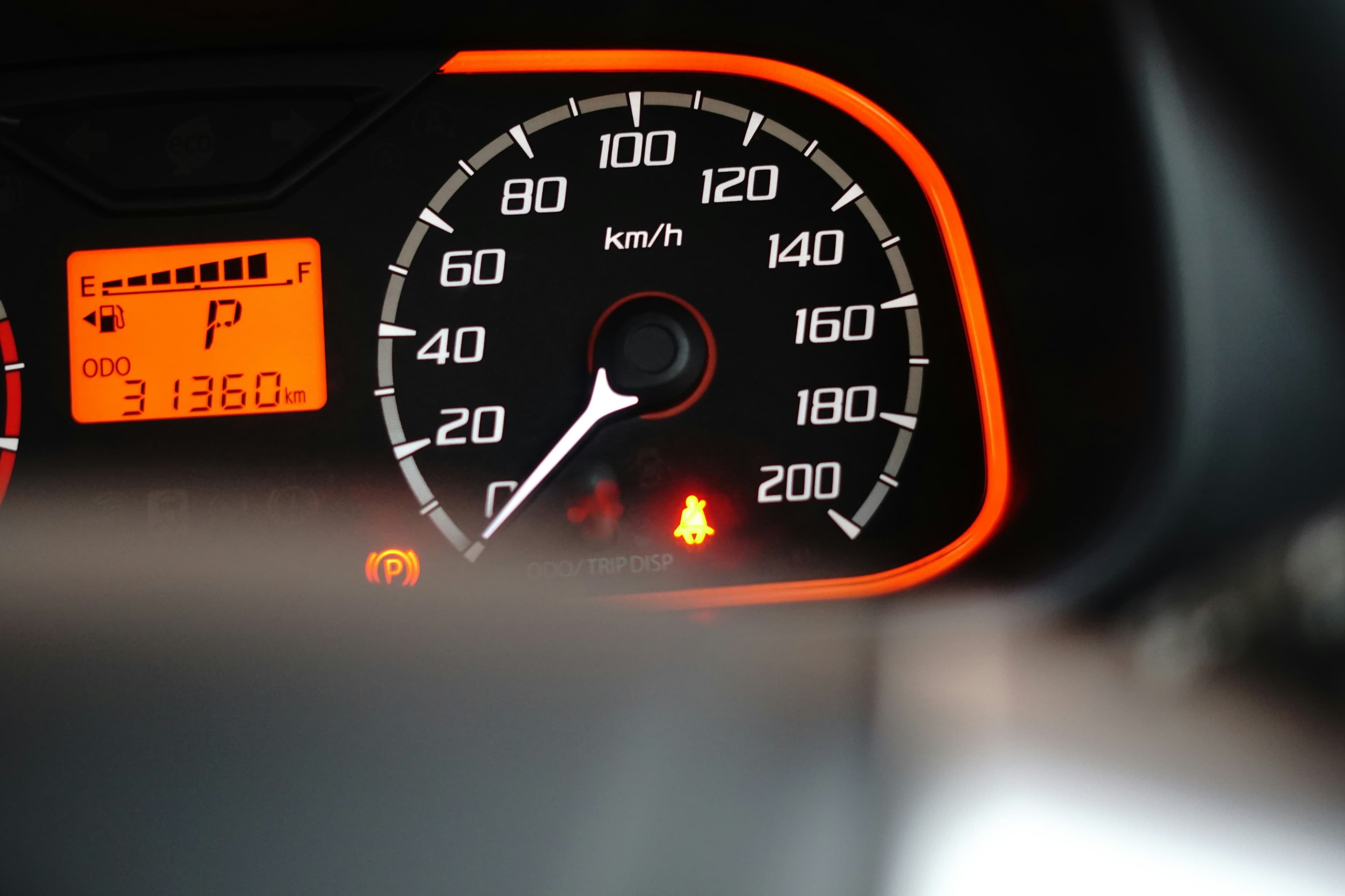 A car speedometer.