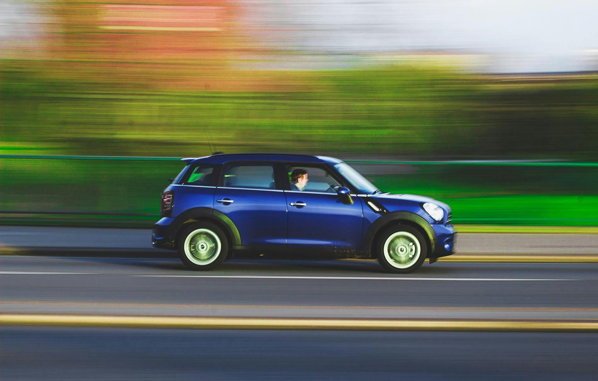 A car being driven at high speed.