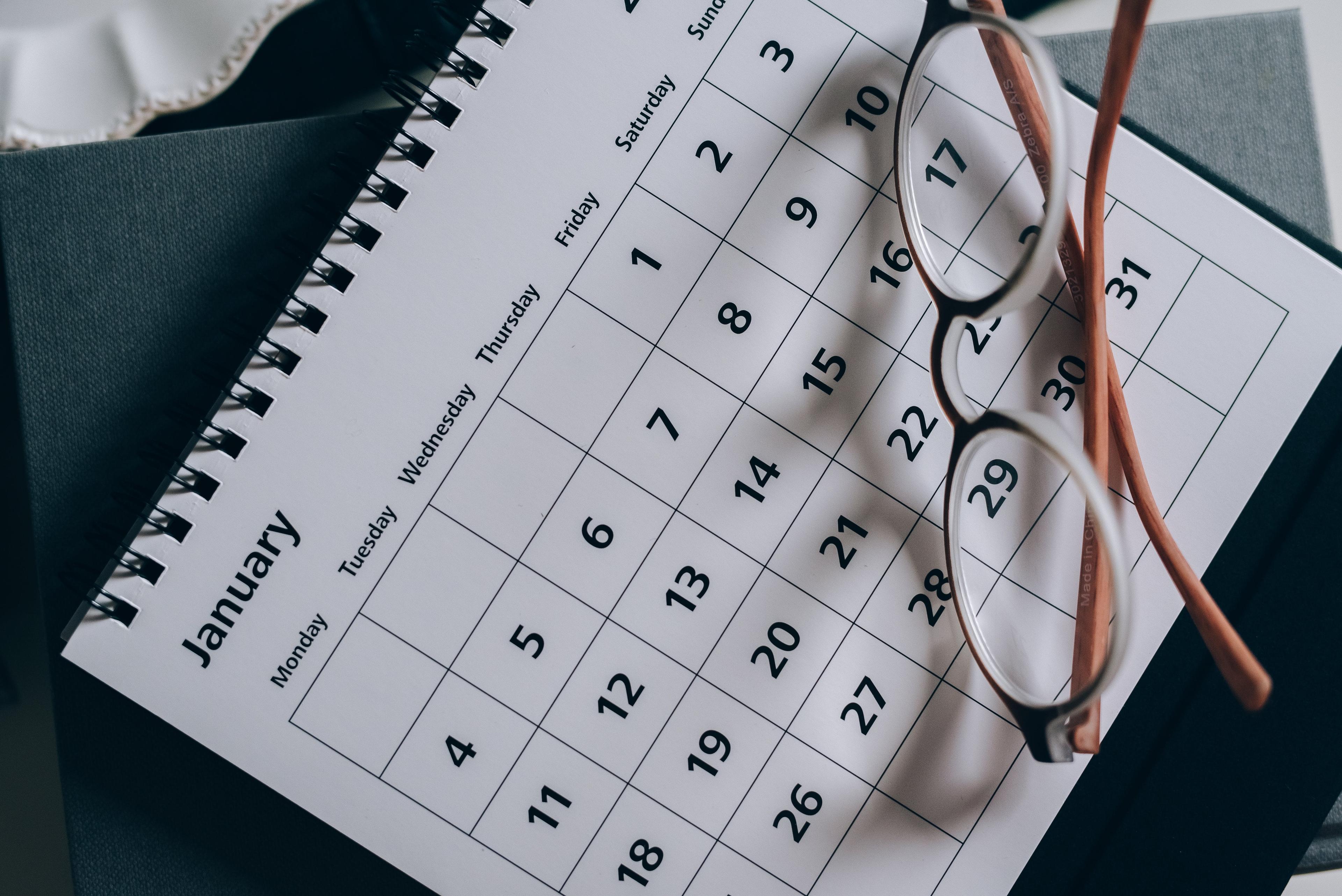 A calendar with glasses on it.