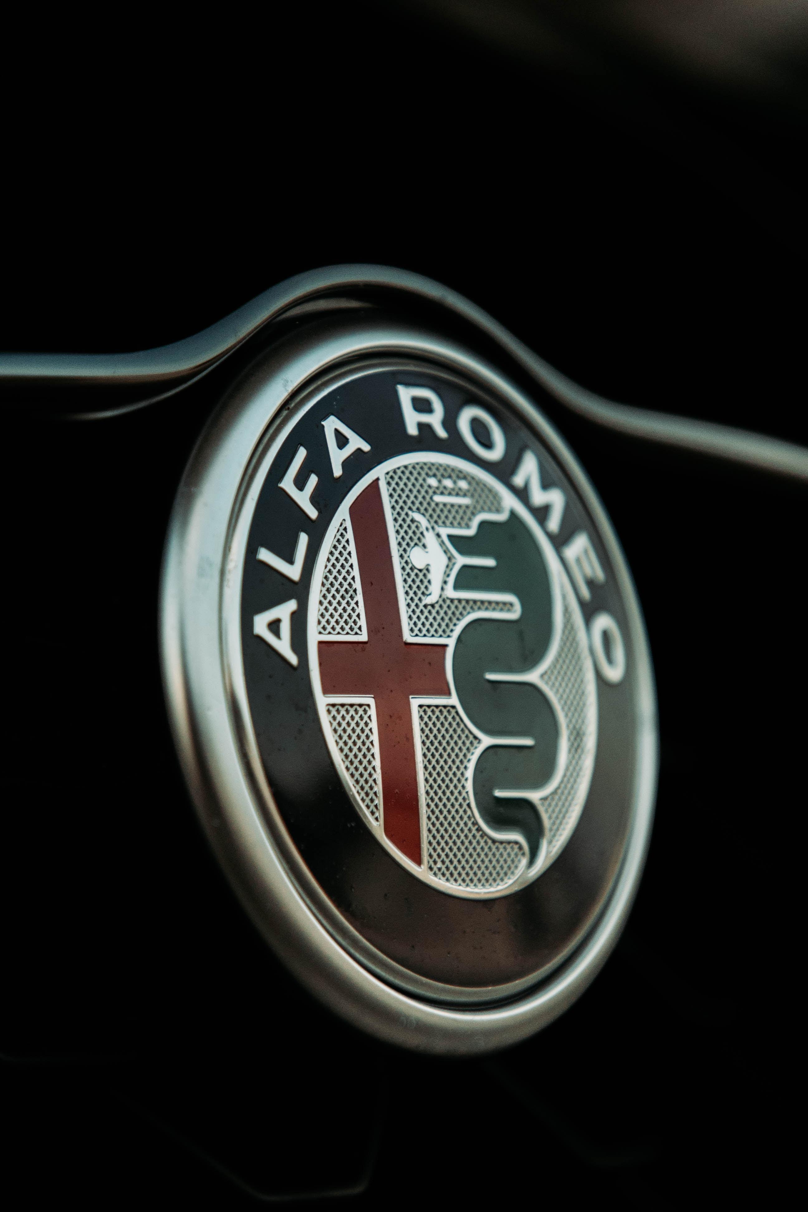 The Alfa Romeo logo on a black background.
